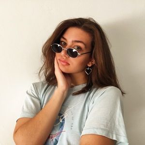 black slim oval metal vintage sunglasses